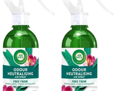 two bottles of soap with a spray bottle of liquid