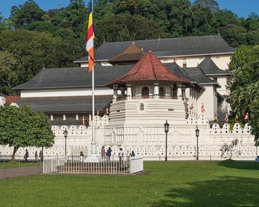 a large white building with a flag on it