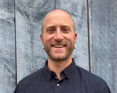 head shot of Harrison Blum smiling