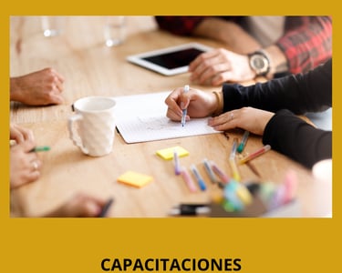 Personas escribiendo en una capacitación Tomar la Palabra