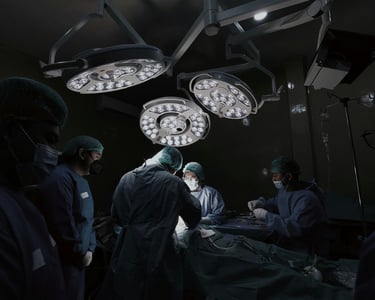 a group of people in a hospital room