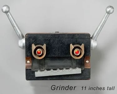 Assemblage robot head built by artist Tal Avitzur from vintage foundry mold.