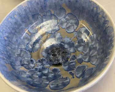 A crystalline glazed ceramic bowl.