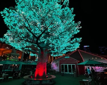 a tree with a green tree in the middle of it
