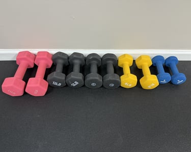 Neoprene dumbbells in pastel colors for safe strength training and bone health workouts