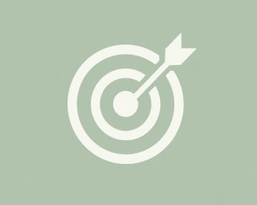 A white target icon with an arrow hitting the bullseye on a sage green background.