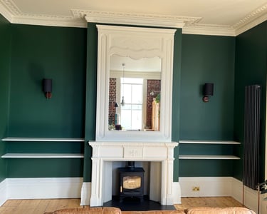 Interior painting and decorating in a Brighton period property with fireplace and detailed finishes