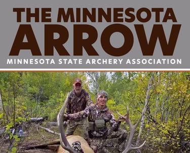Bo Holand and his father posing with his harvested elk