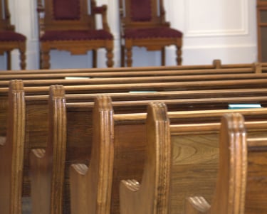 rows of wooden church pews