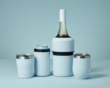 Product photography - A bottle of wine and a can inside two Huski coolers