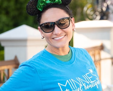 Nora Stewart pictured at Disney's Magic Kingdom® Park.