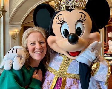 Leslie Hammer pictured with Minnie Mouse at Disneyland® Paris.