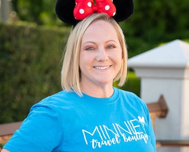 Amy Haskell pictured at Disney's Magic Kingdom® Park.