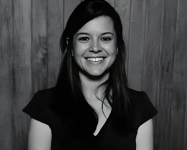 Professional psychologist smiling for a photo in formal wear