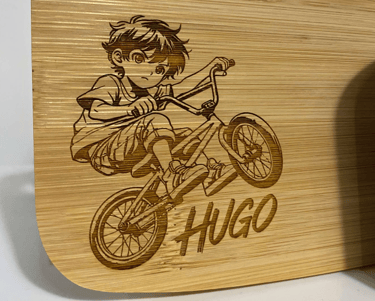 a wooden cutting board with a wooden cutting board with a boy on it