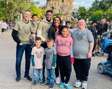 Shani Roberts pictured with her family at Disney's Animal Kingdom® Park, at Walt Disney World®.