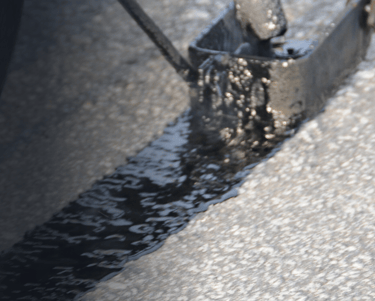 Parking Lot Crack Sealing by Chattahoochee Valley Sealcoating