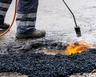 Long lasting pothole repairs by Chattahoochee Valley Sealcoating for Newnan, Georgia
