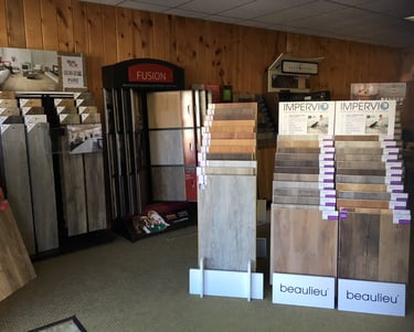 a room with a lot of wood flooring and a lot of wood flooring