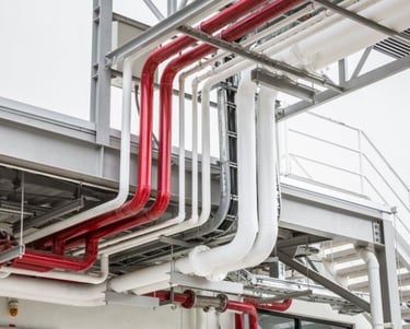 A bunch of pipes and pipes in a building. 