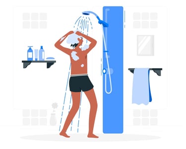 Un humain se lave avec le régulateur de douche, économisant jusqu'à 50 % d'eau