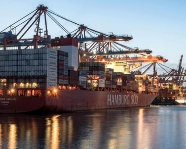 a large container ship docked at a dock