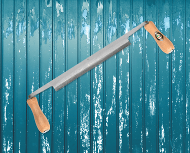 a drawknife on a wooden table