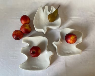a group of fruit and a pear tree