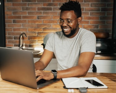 man working on his computer
