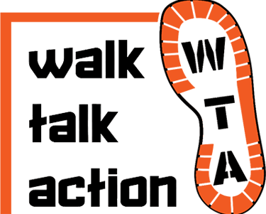 a pair of shoes with the words walk talk action