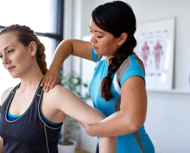 License massage therapist treating client