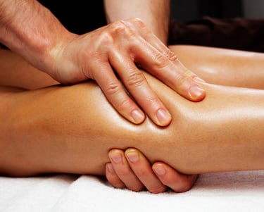 massage therapist performing manual lymphatic drainage massage