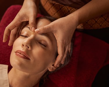 a woman getting a massage at a spa