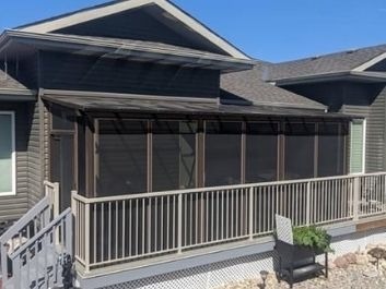 Screen Room with patio cover built behind the railing.