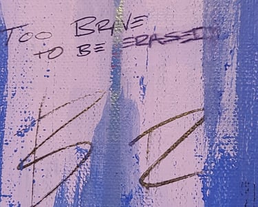 Part of a painting by artists Dwight White that says "Too Brave To Be Erased"