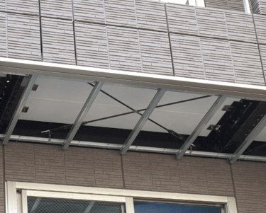 a clock tower over a building with a clock on it