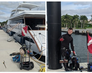 Diver perfoming underwater hull cleaning on a yacht in Palm Beach marina