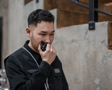 AKL staff using walkie talkie commmunication