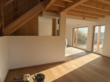 a room with a staircase and a staircase