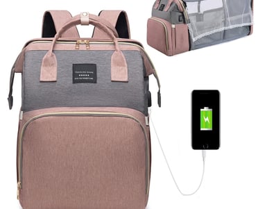 Baby diaper bag backpack with portable crib and changing station.  USB charging port and stroller connecting straps.  