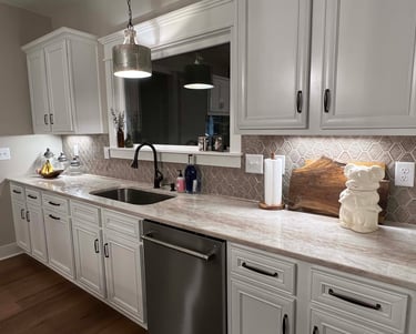 Marble top in custom-built bathroom with modern fixtures