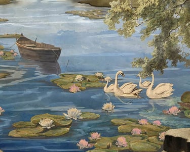 Vintage landscape painting of white swans swimming among water lilies near a wooden boat on a blue river.