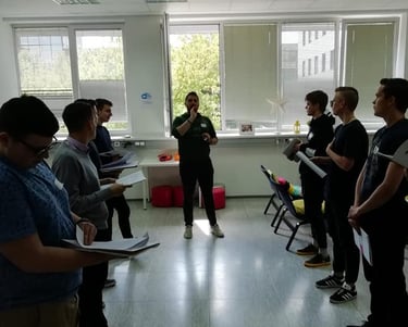 a man standing in a room with a microphone and a microphone