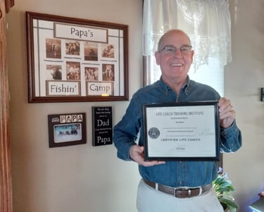 Daniel Bean holding Life Coach Certificate