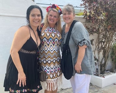 three women standing next to each other. Day of the Dead Retreat