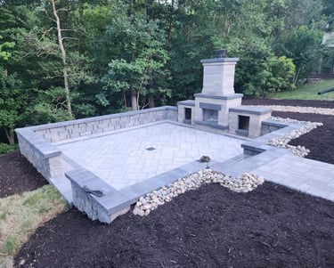 Outdoor fireplace in Williamsburg VA created by The King's Garden