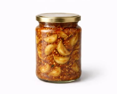 Spicy garlic pickle prepared in traditional oil blend for global markets