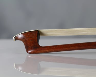 Fine violin bow rehairing