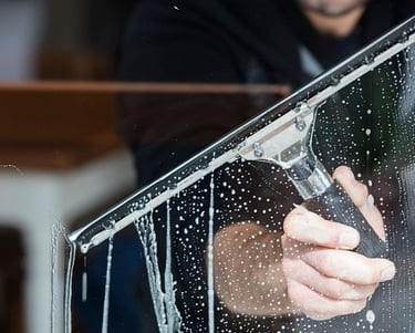 window cleaning squeegee by refresh property services in san antonio, tx