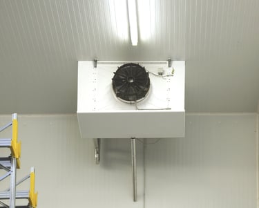 a fan on a ceiling in a room